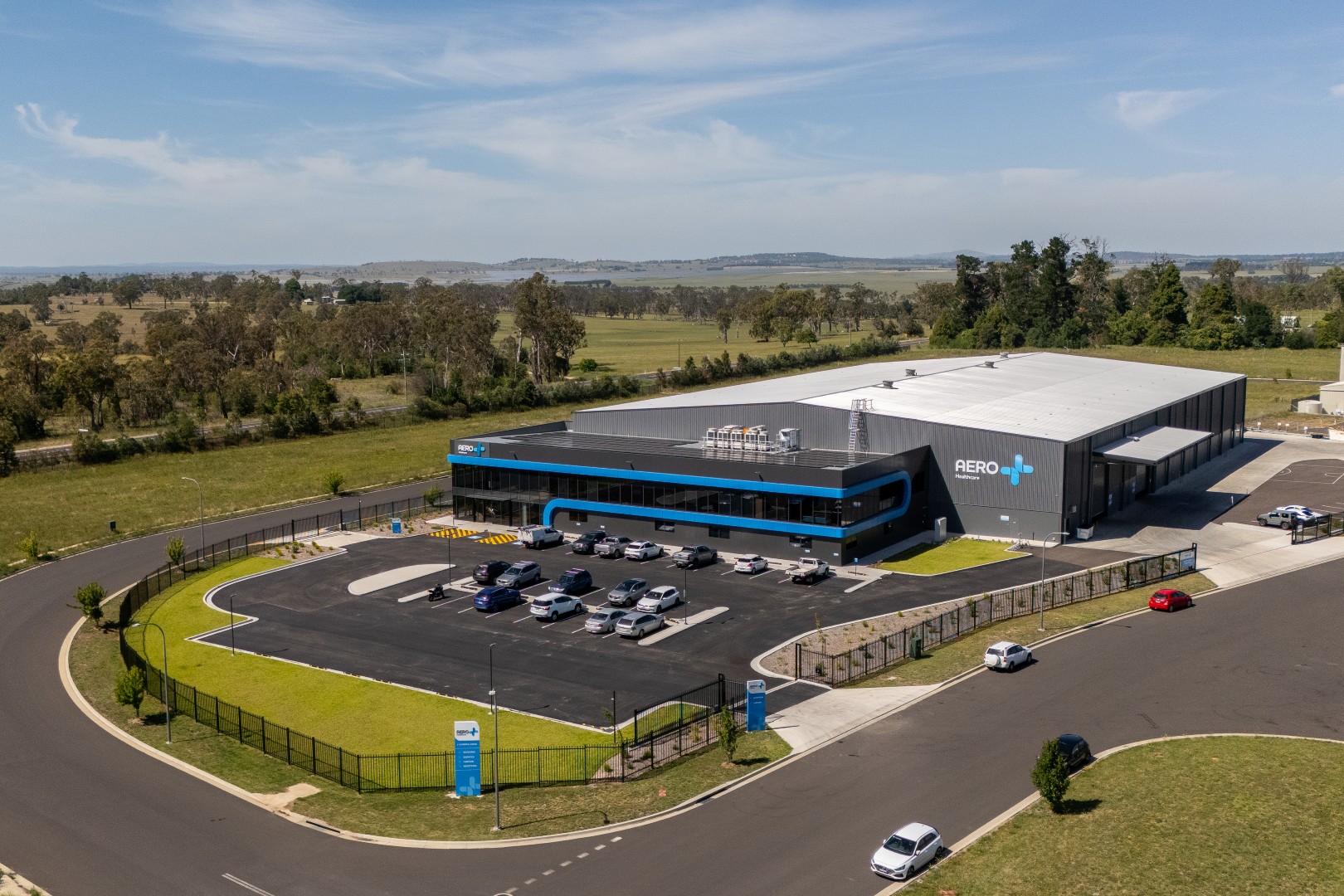 Aerial view of a large-scale steel building facility designed for commercial operations, logistics efficiency and long-term performance.