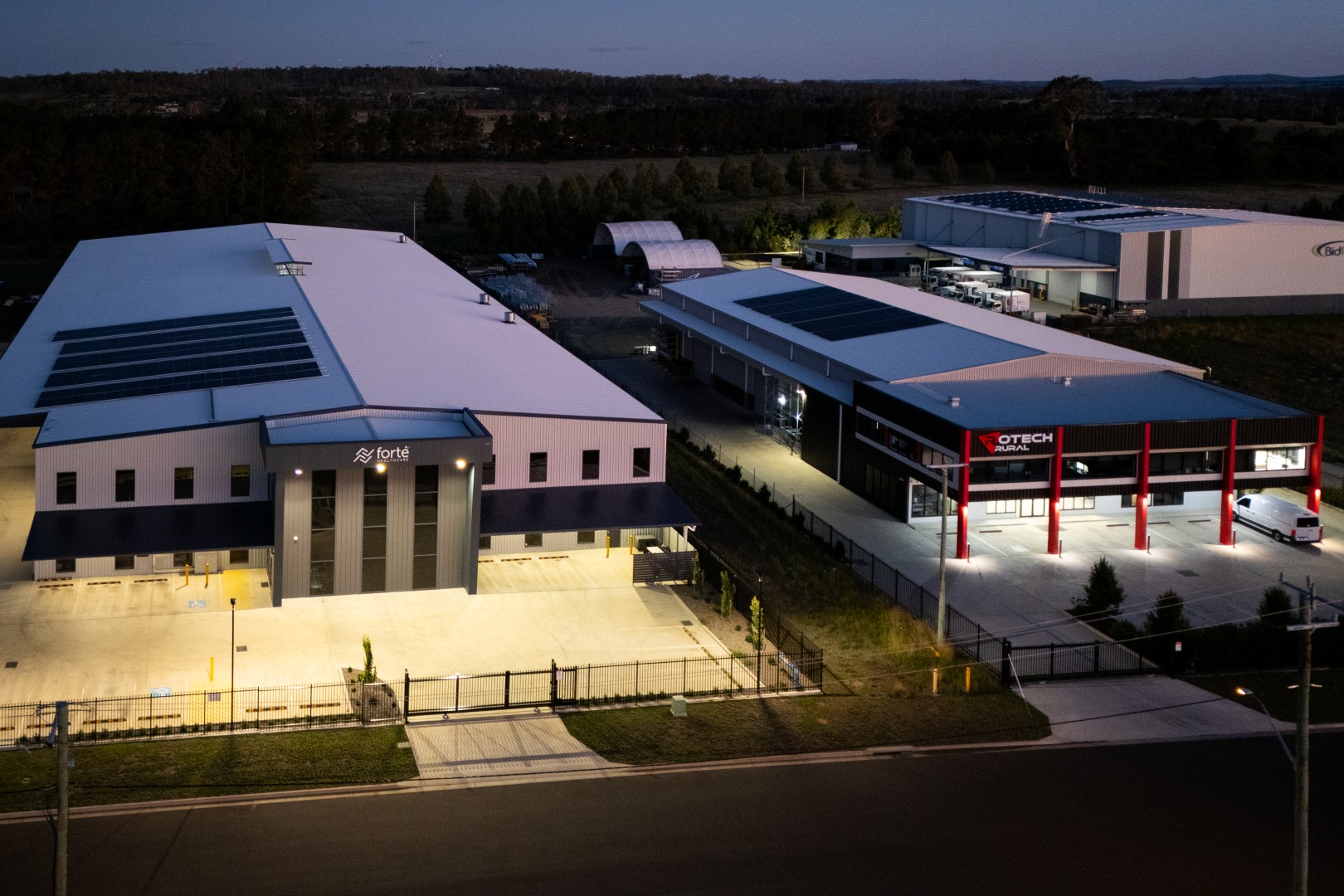 Drone shot of Forte Healthcare, Rotech Rural and Bidfoods in the evening - all build by TechSpan