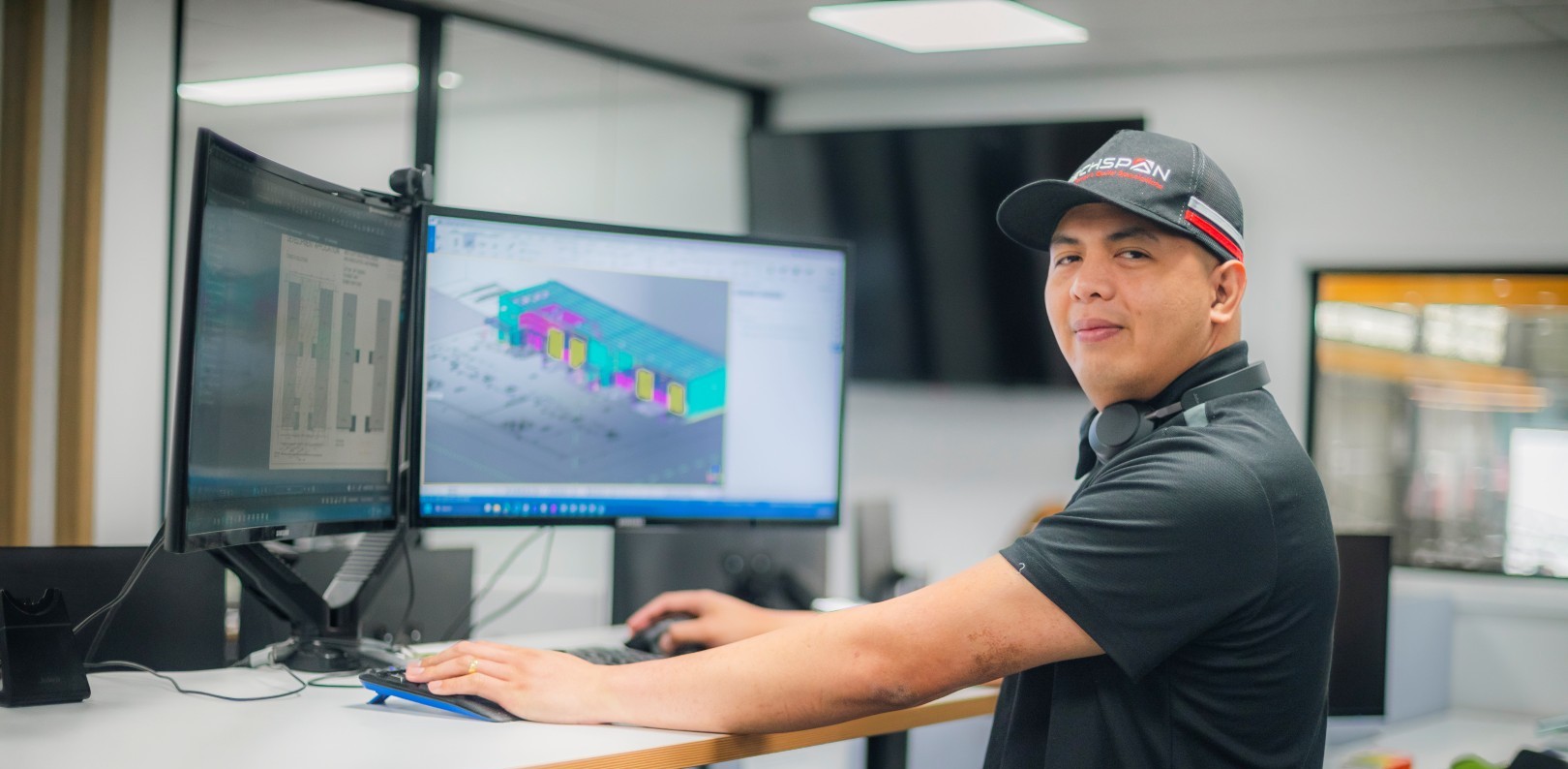 TechSpan drafting team member reviewing structural steel building drawings